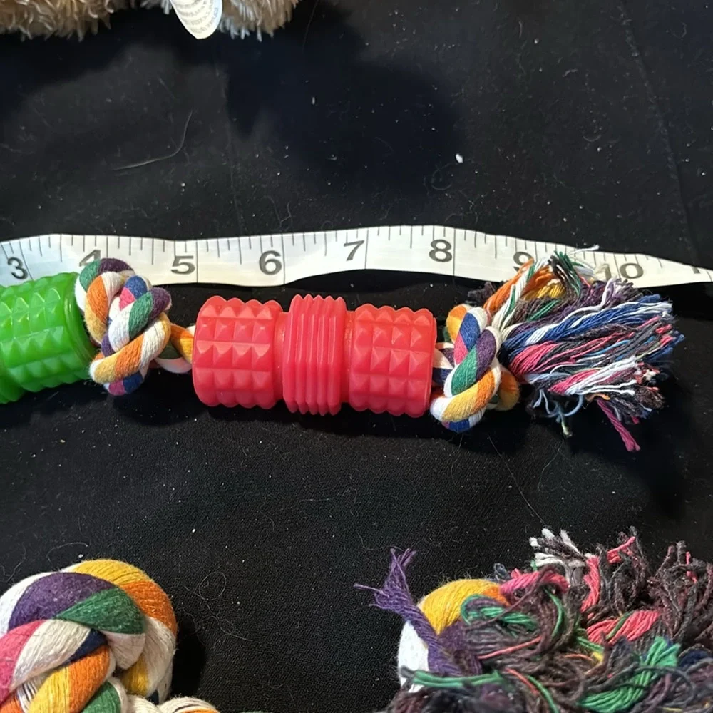 New 5 dog toys. For medium dog 3 rope 1 ready bear and 1 Hertz dura play toy